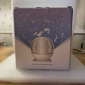 Starry Night Light Projector with Blue and White Design